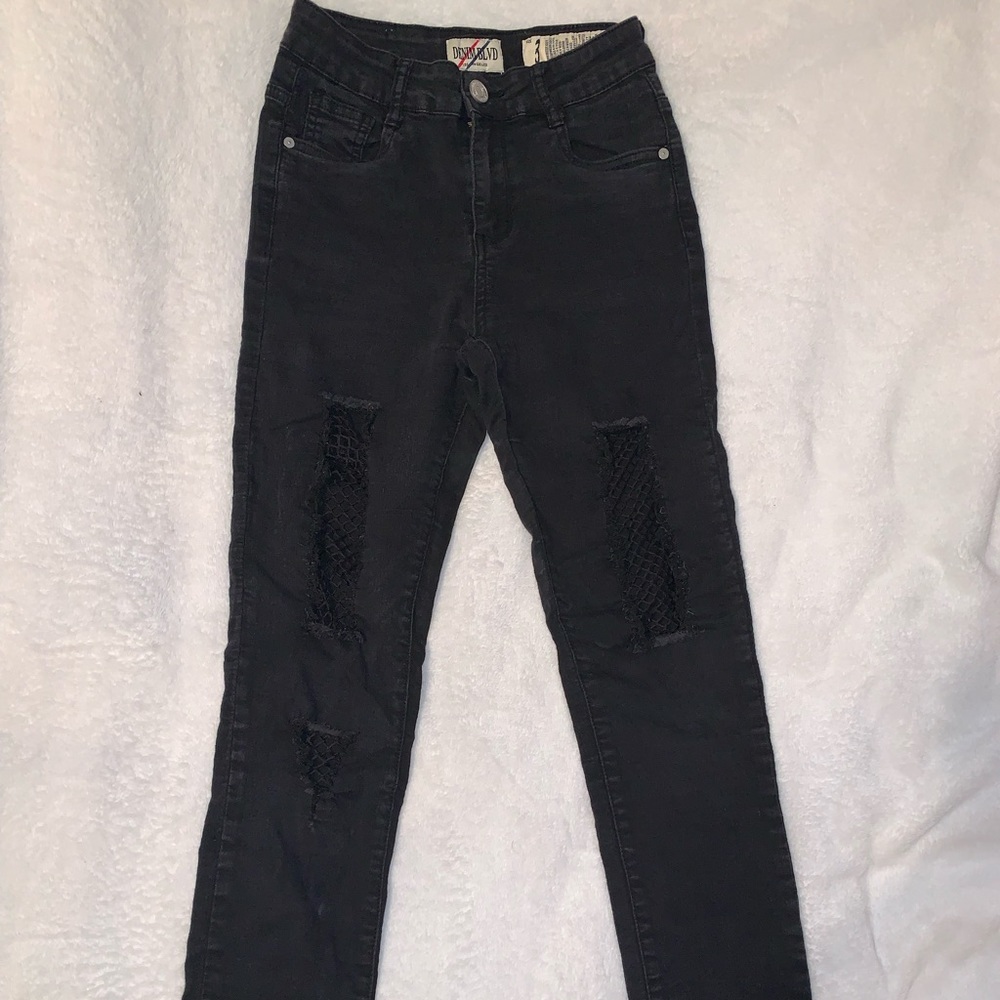Black fishnet ripped jeans